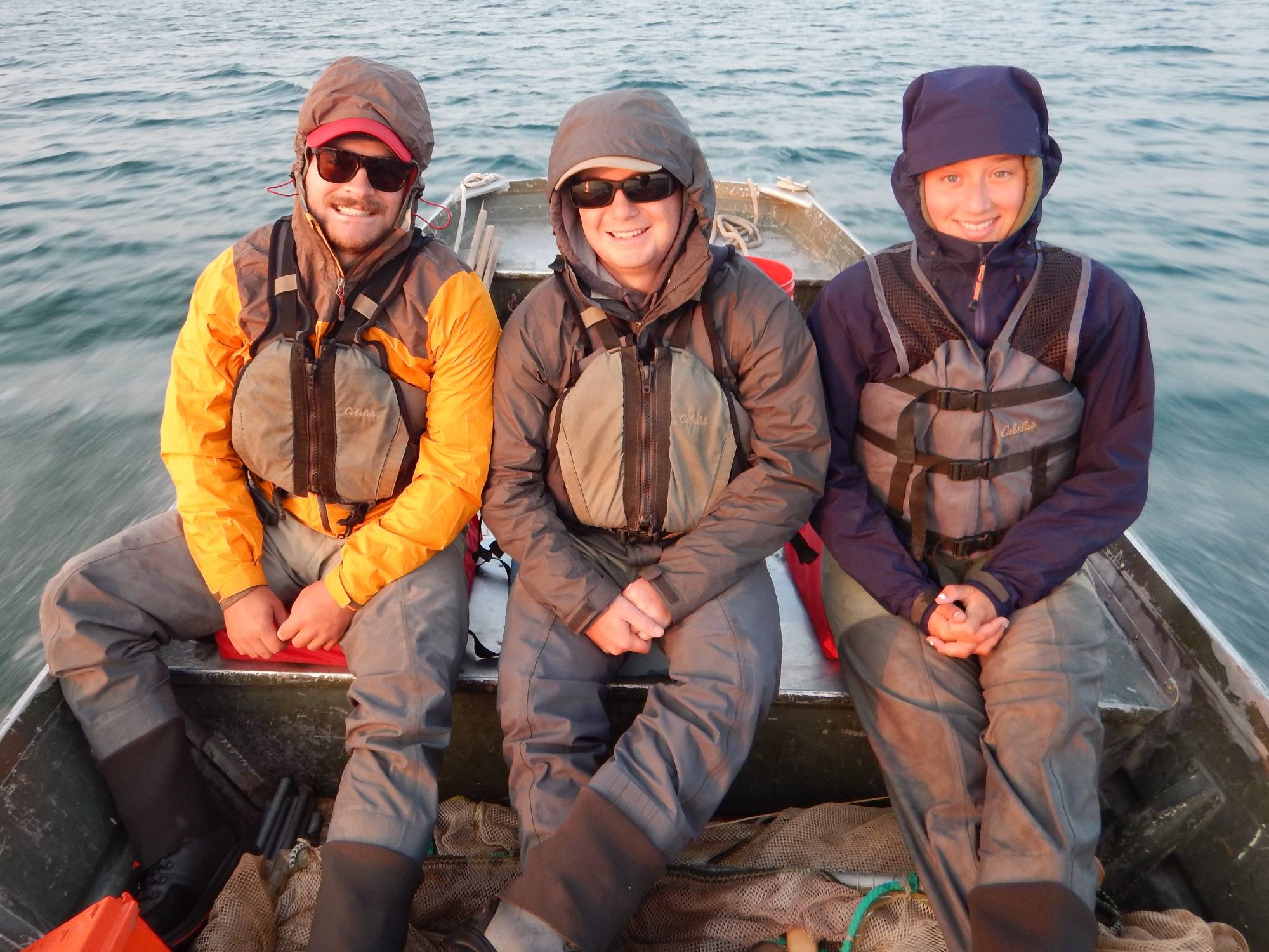students riding in boat